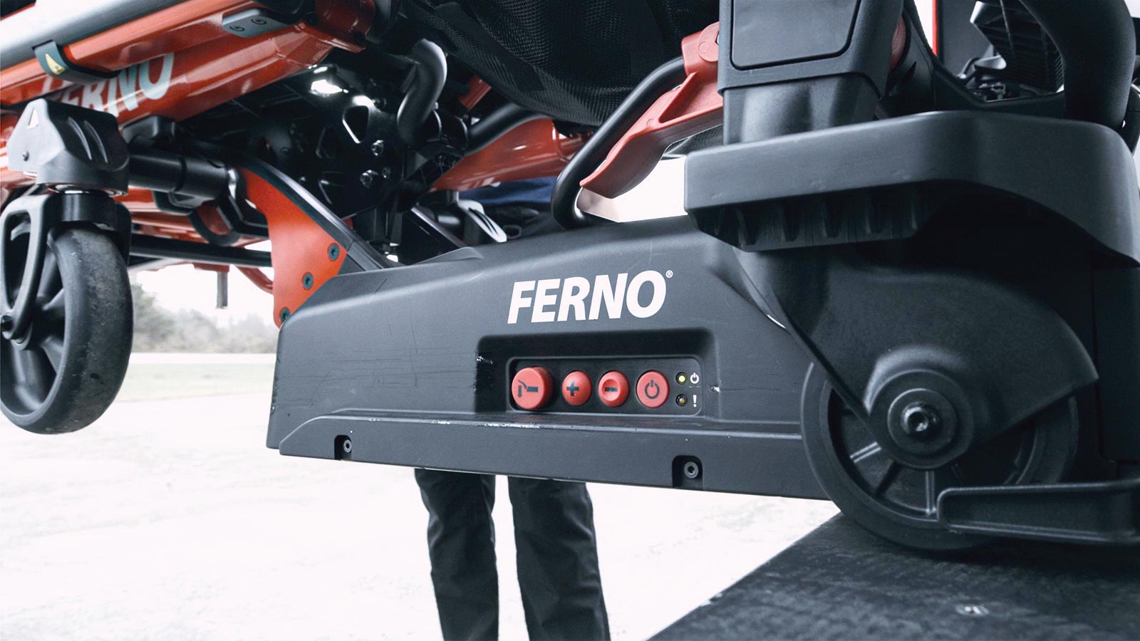 Close-up of the Ferno Power F2 lifting the Ferno Power X2 Ambulance Cot