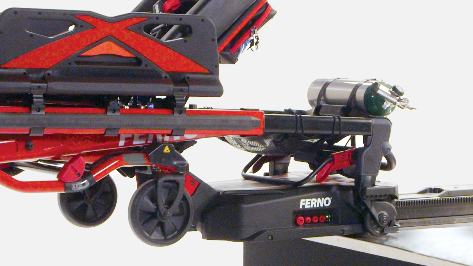 Close-up of the Ferno Power F2 loading the Ferno Power X2 Ambulance Cot